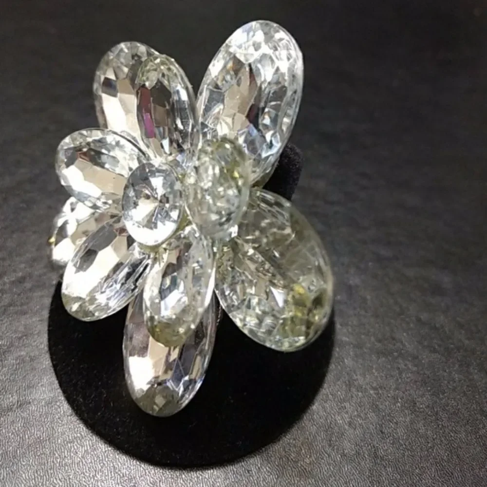 Silver tone sparkly flower bling ring